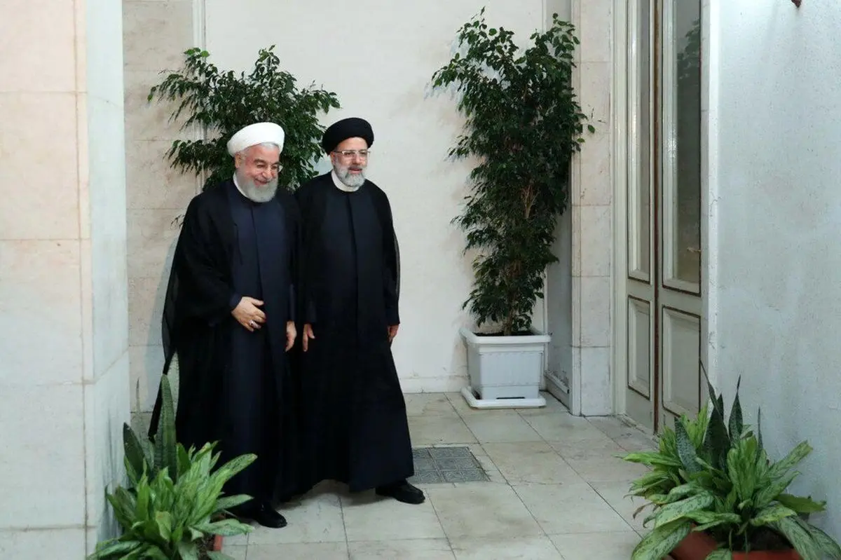 تصویری از روحانی و رئیسی دوشادوش یکدیگر