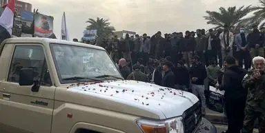 تشییع نمادین شهدای الحشد الشعبی با حضور گسترده مردم در بغداد