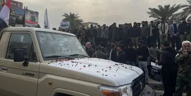 تشییع نمادین شهدای الحشد الشعبی با حضور گسترده مردم در بغداد
